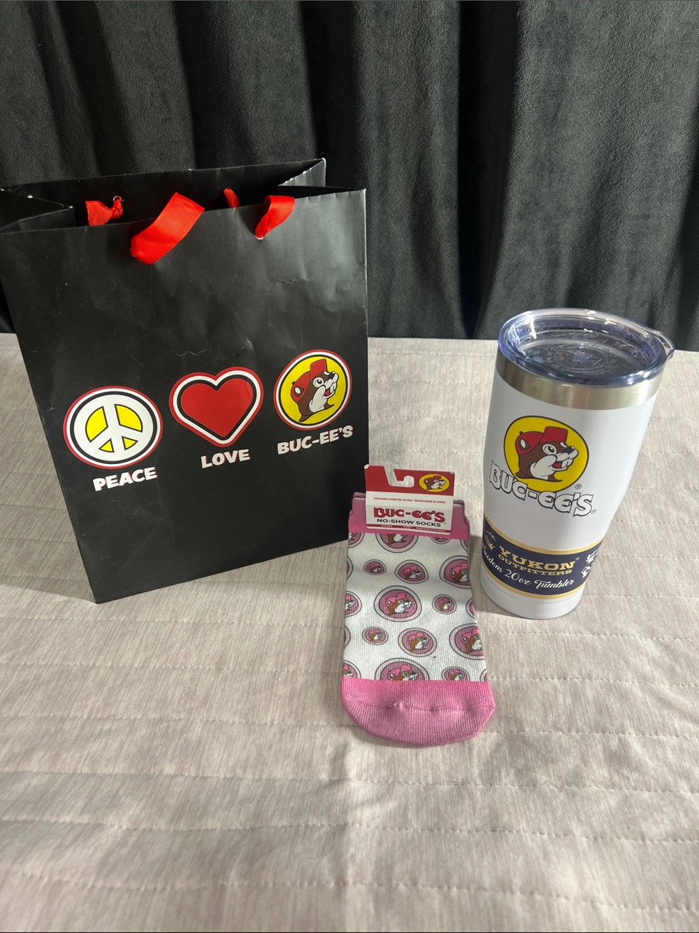 BUC-EE’S 20oz Tumbler and No Show Socks.  Free gift bag and 2nd surprise sock.